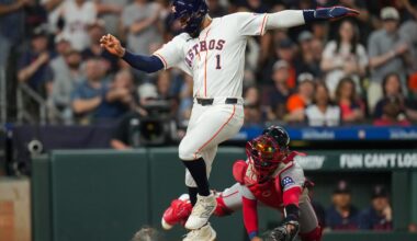 Carlos Correa beat the tag attempt by Red Sox catcher Connor Wong to score during the Astros' three-run fifth inning.