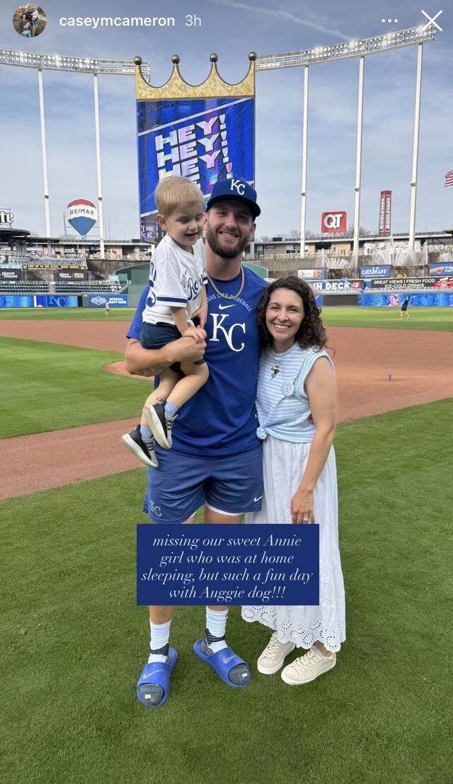 Royals pitcher Noah Cameron, his wife Casey and their son, Auggie, at The K on opening day Monday.