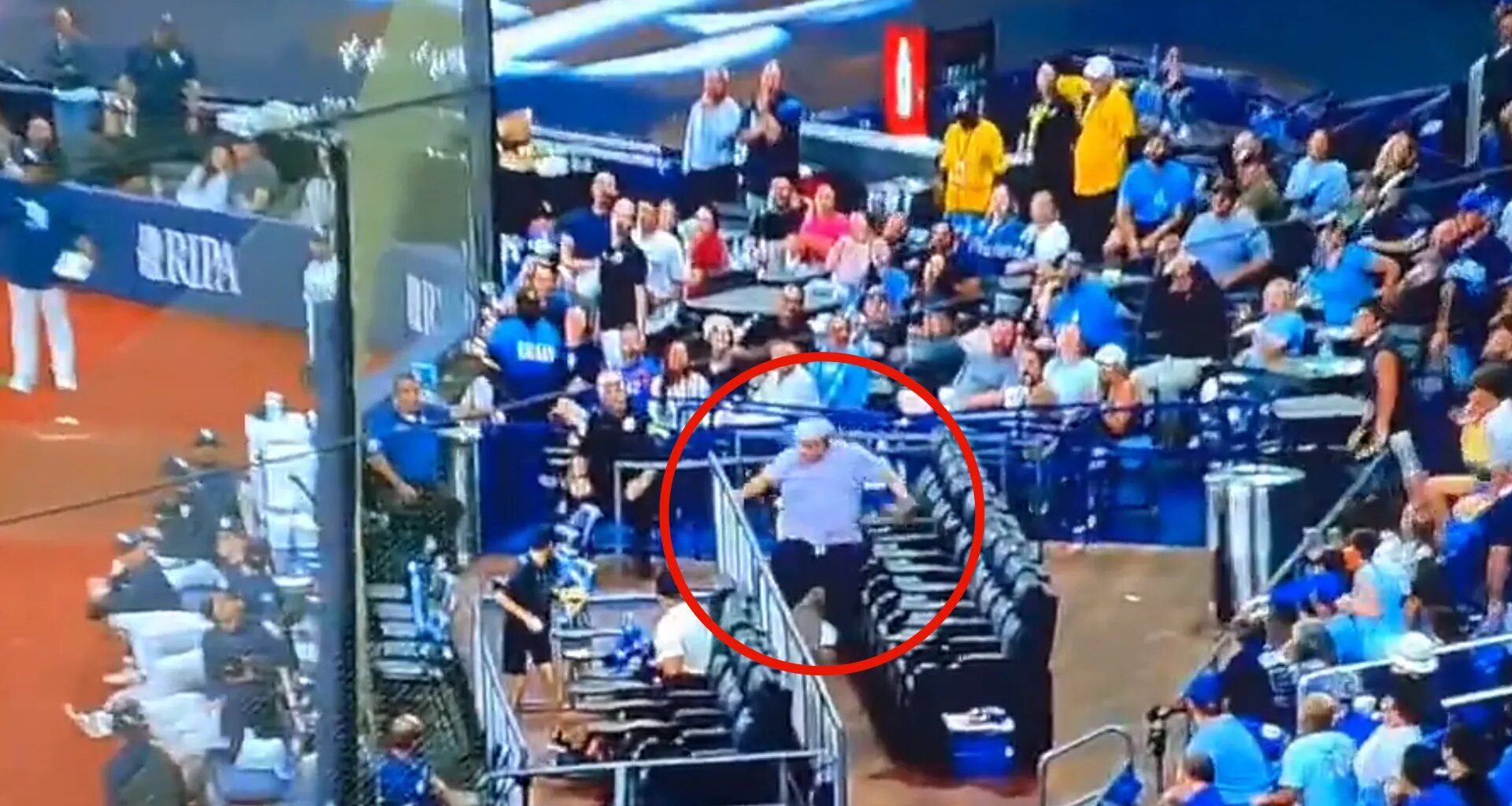 Hilarious moment MLB fan's pants fall down as he tumbles over while chasing foul ball at Cubs-Rays