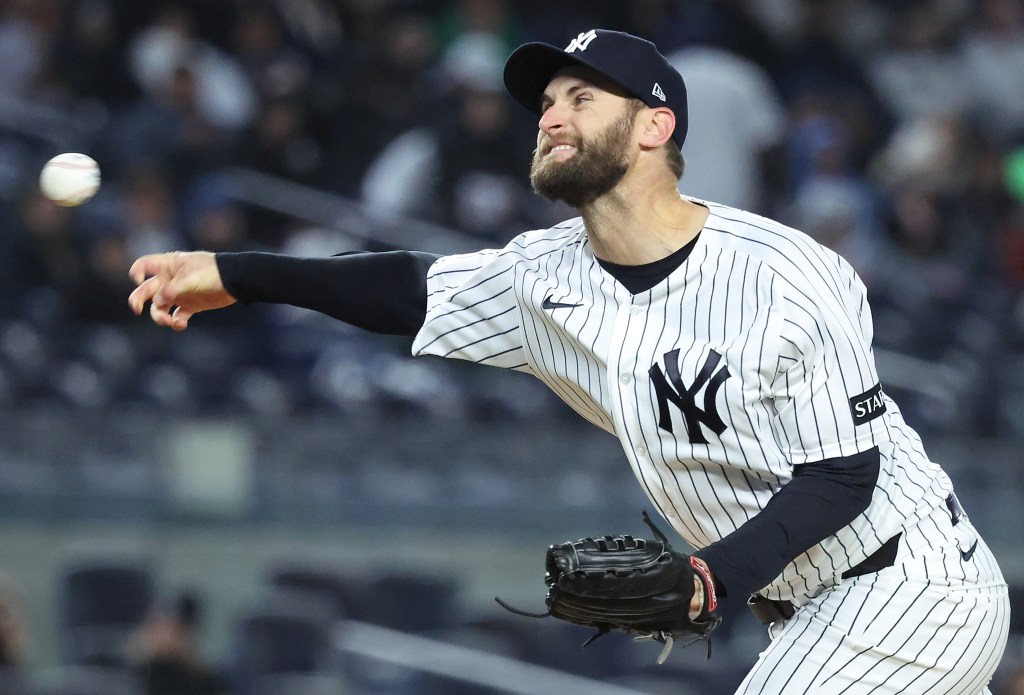Jake Bird throws a pitch during the sixth inning of the Yankees' comeback win over the A's. 