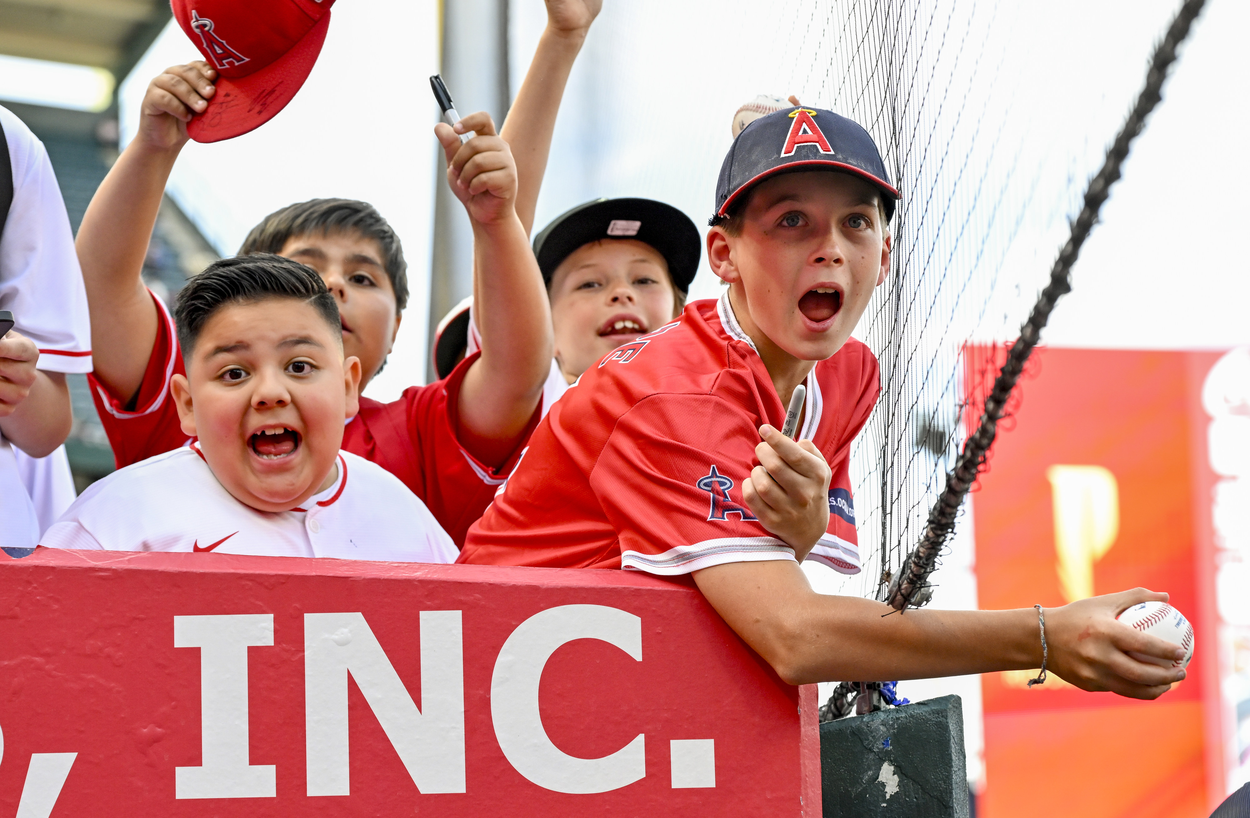 Kids spot Angels catcher Logan OâHoppe in the dugout and...