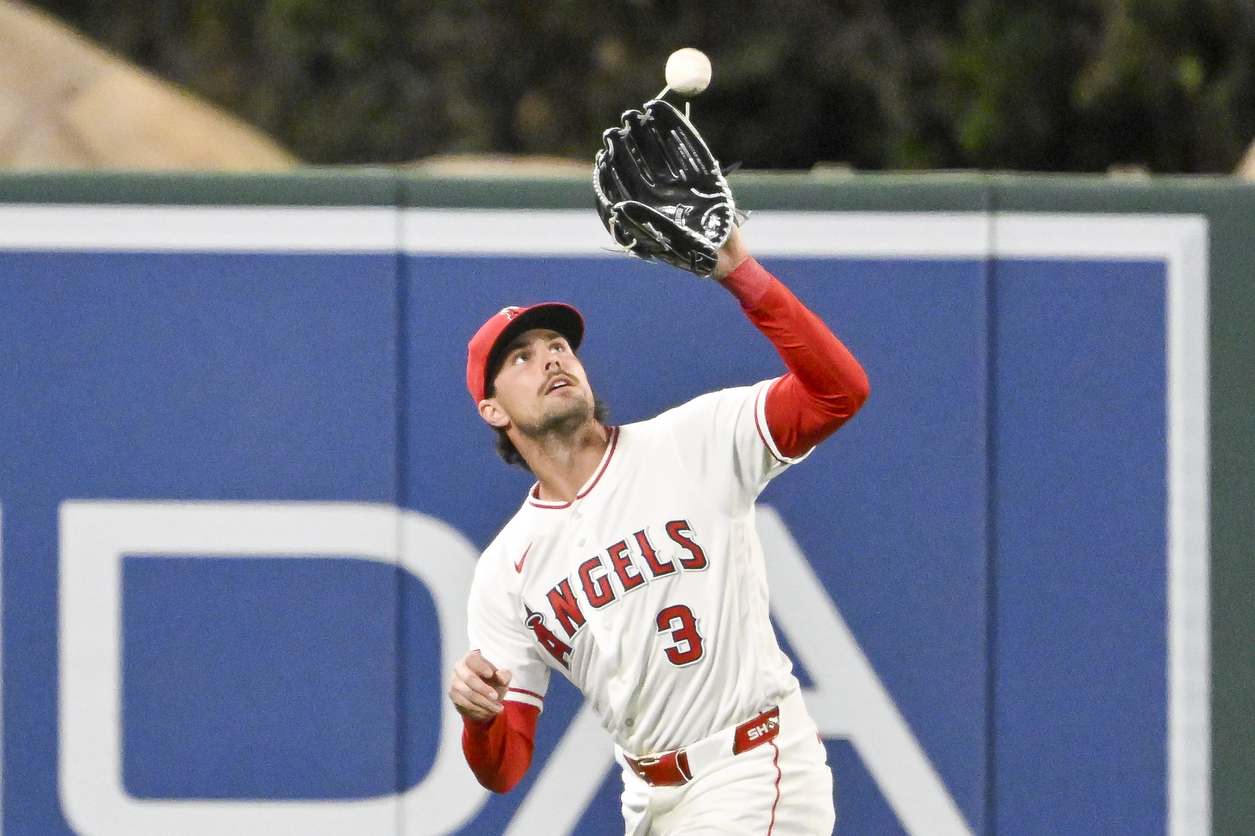 Angels left fielder Josh Lowe catches a fly ball hit...