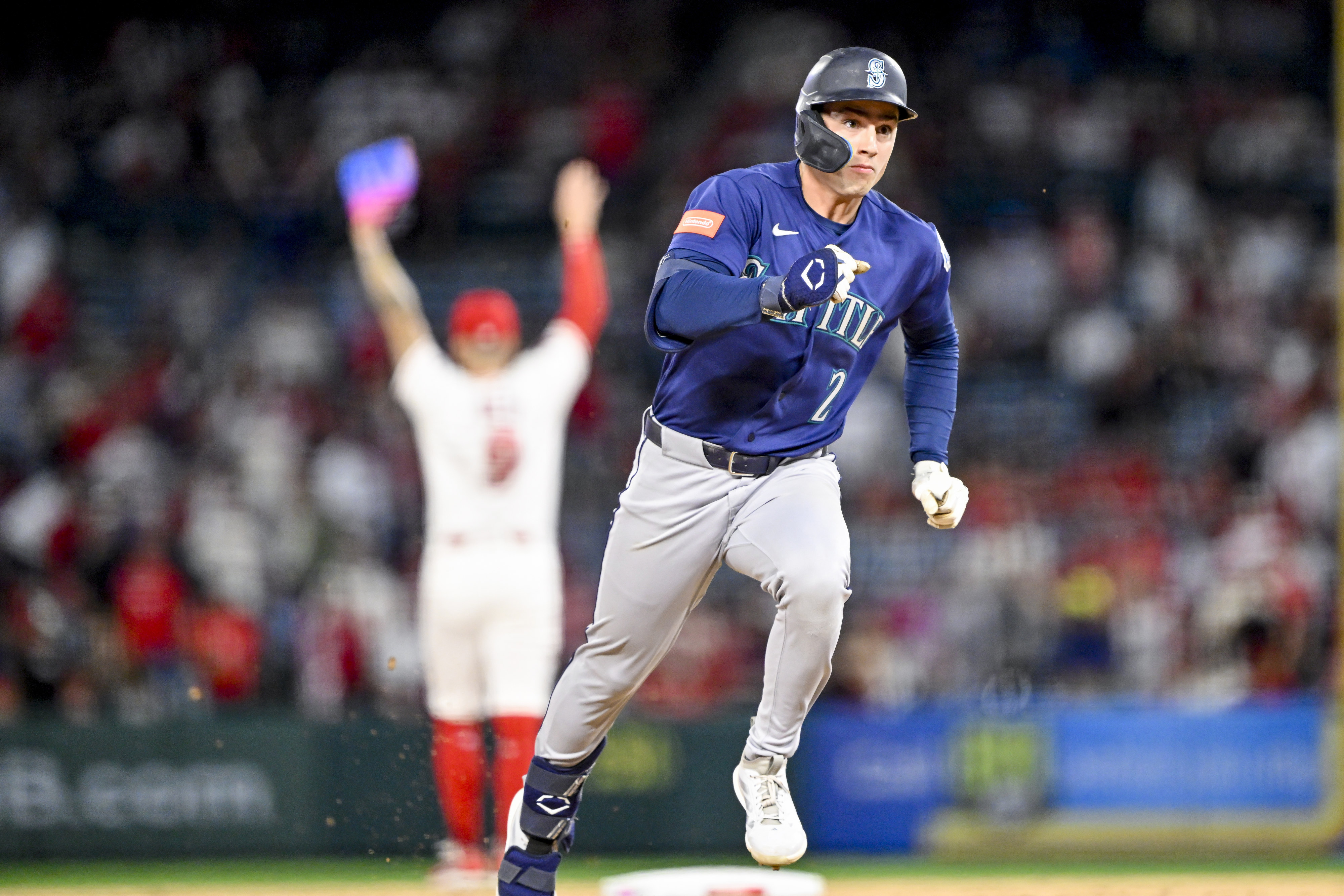 Cole Young (2) of the Mariners triples on a fly...