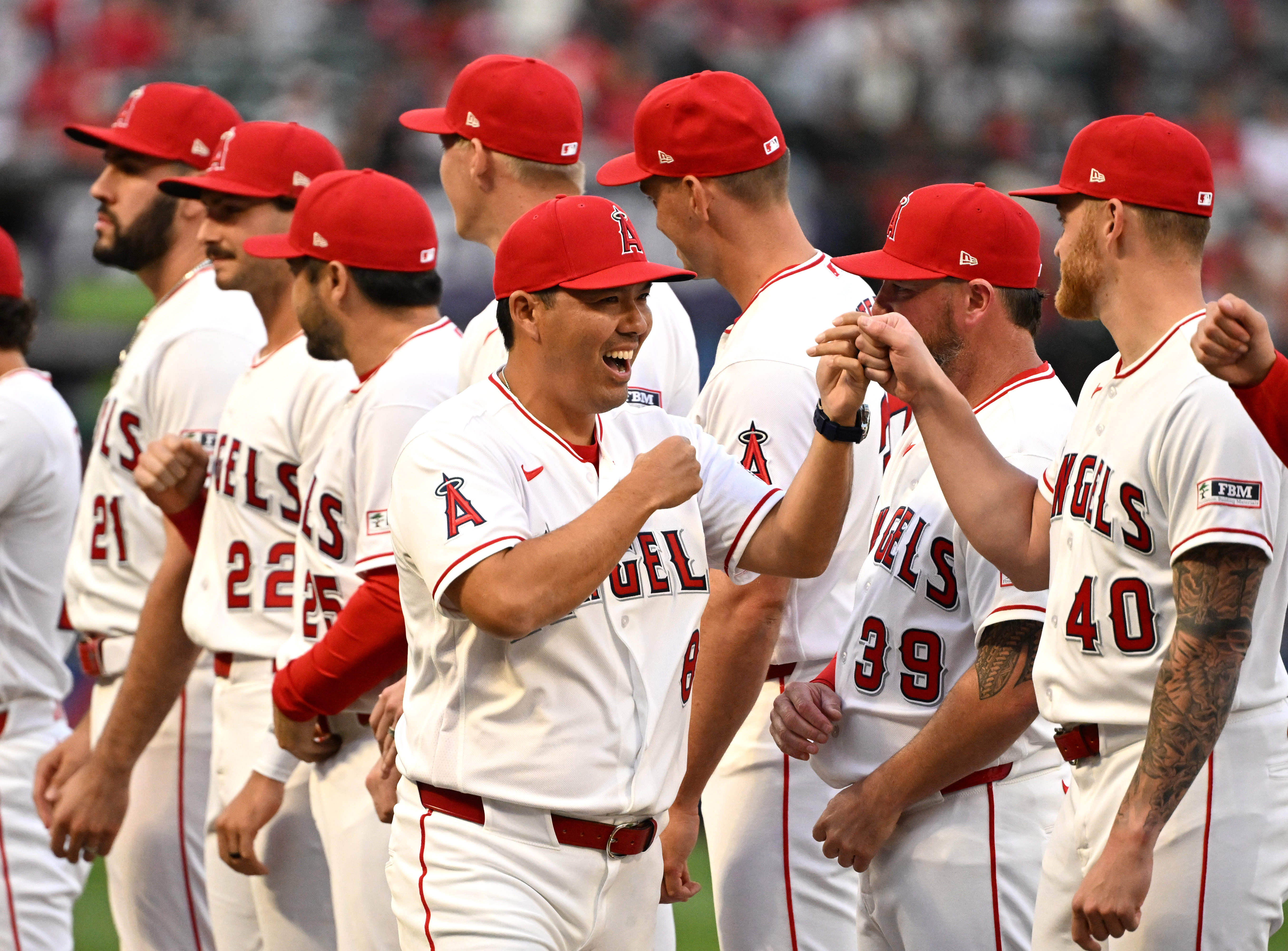 Manager Kurt Suzuki #8 of the Los Angeles Angels high...