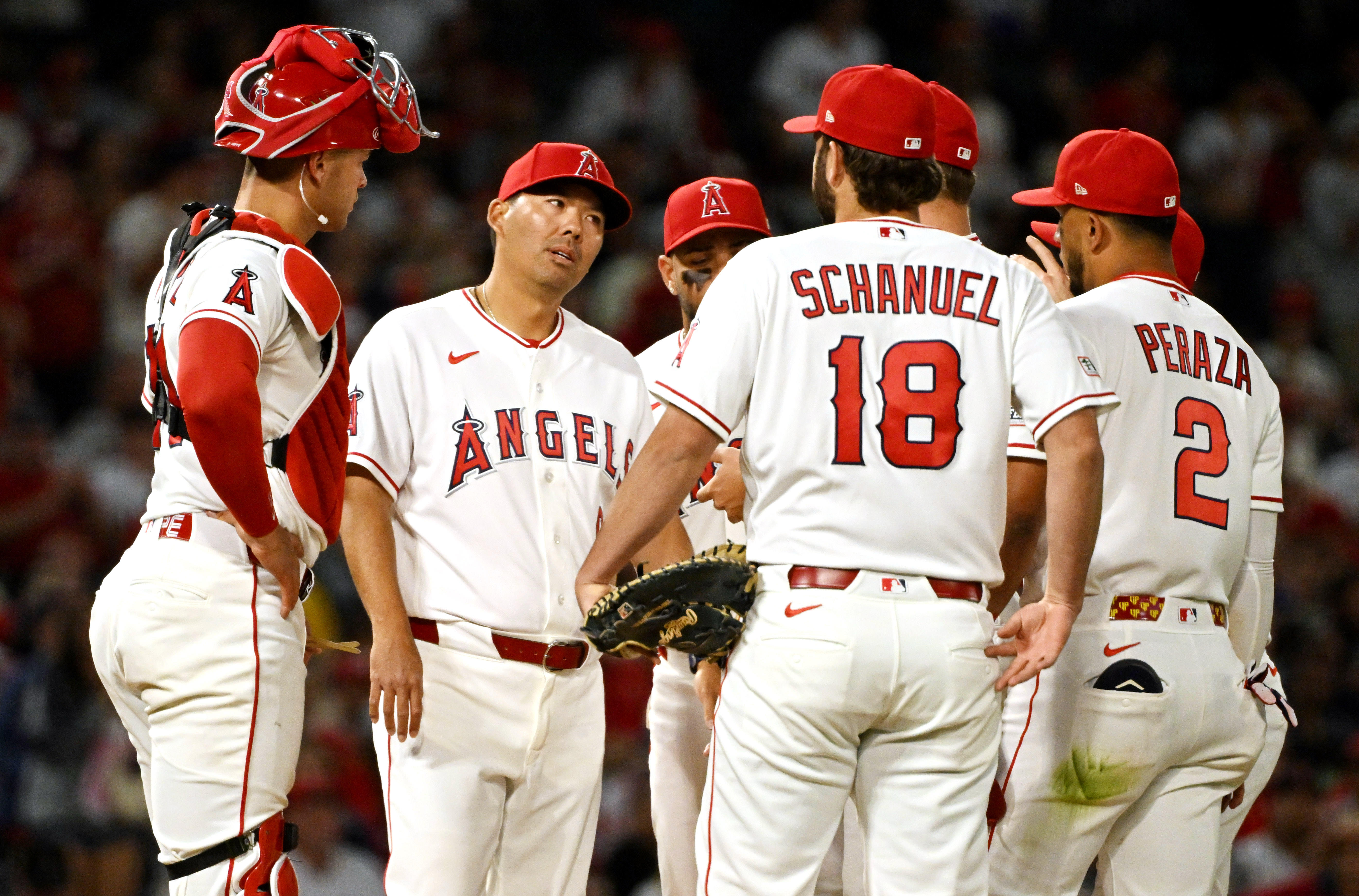 Manager Kurt Suzuki #8 of the Los Angeles Angels takes...