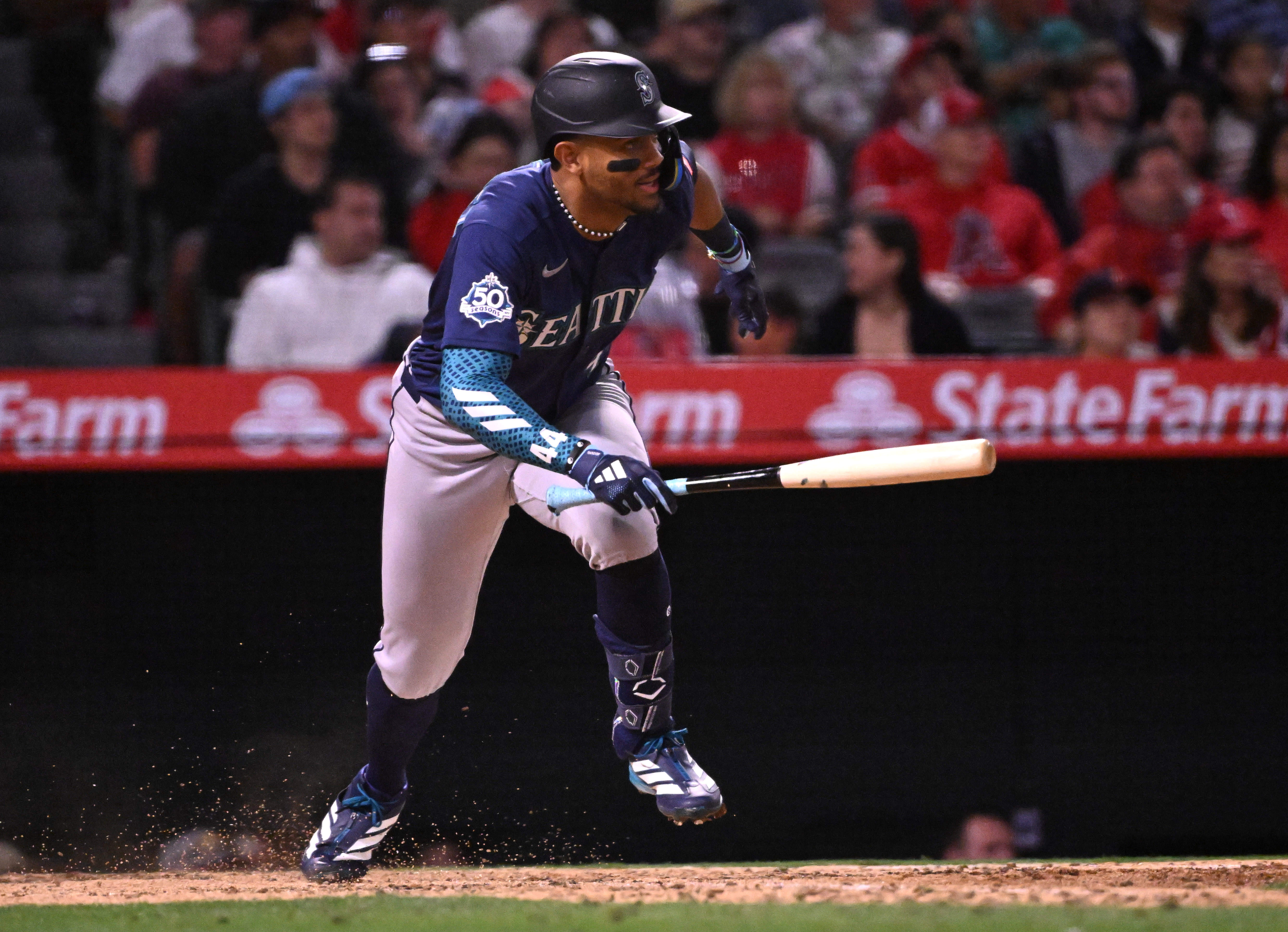 Julio RodrÃ­guez #44 of the Seattle Mariners singles against the...