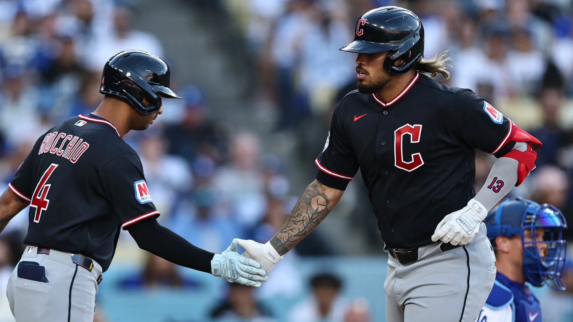 Gabriel Arias #13 of the Cleveland Guardians celebrates a home run against the Los Angeles Dodgers in the third inning at Dodger Stadium on April 01, 2026 in Los Angeles, California.