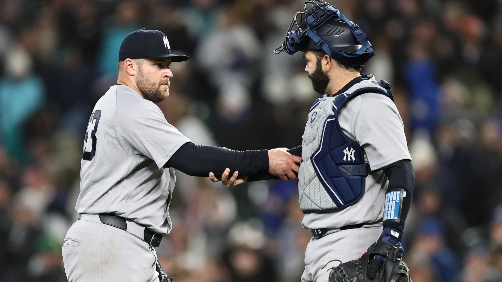 David Bednar #53 and Austin Wells #28 of the New York Yankees celebrate their win against the Seattle Mariners at T-Mobile Park on April 01, 2026 in Seattle, Washington. (Photo by Steph Chambers/Getty Images)