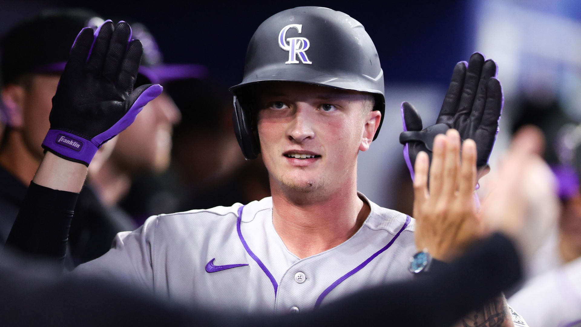 TJ Rumfield #7 of the Colorado Rockies celebrates with teammates after hitting a home run against the Miami Marlins in the second inning of the game at loanDepot park on March 28, 2026 in Miami, Florida. (Photo by Megan Briggs/Getty Images)