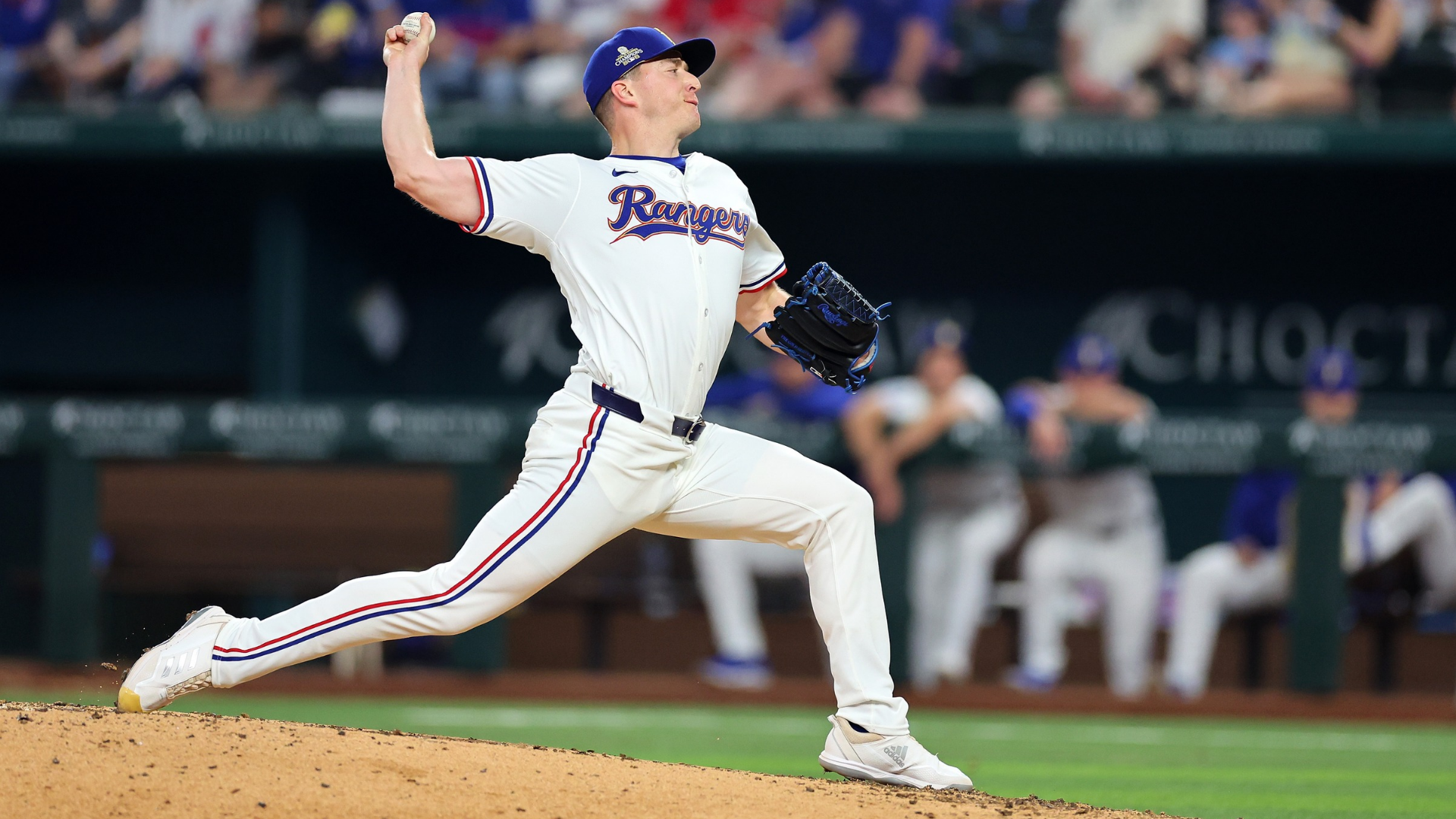 Josh Sborz #66 of the Texas Rangers throws a pitch during the sixth inning against the Chicago Cubs at Globe Life Field on March 30, 2024 in Arlington, Texas. (Photo by Stacy Revere/Getty Images)