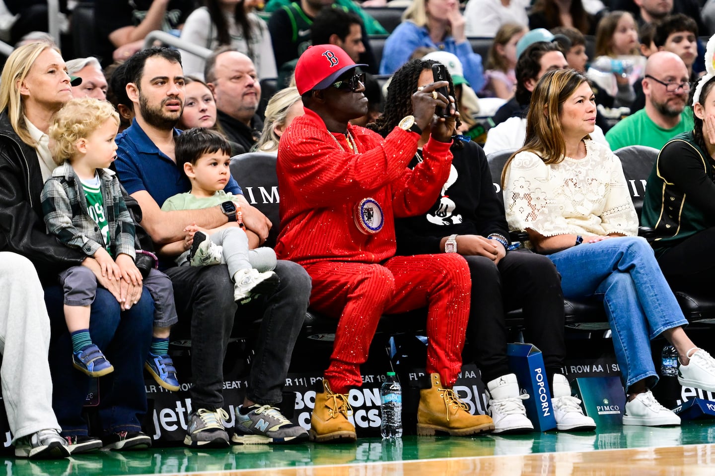 Rapper Flavor Flav spectated during a game between the Boston Celtics and Toronto Raptors at TD Garden on Sunday in Boston.