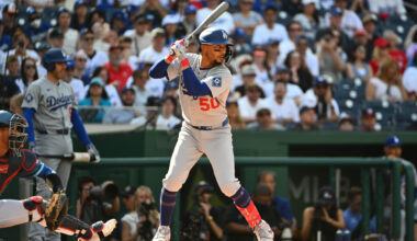 Apr 4, 2026; Washington, District of Columbia, USA; Los Angeles Dodgers shortstop Mookie Betts (50) at bat against the Washington Nationals during the first inning at Nationals Park. Mandatory Credit: Brad Mills-Imagn Images