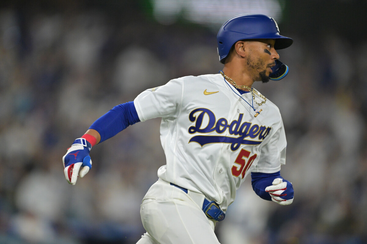 Mar 27, 2026; Los Angeles, California, USA; Los Angeles Dodgers shortstop Mookie Betts (50) runs after hitting a three run home run against the Arizona Diamondbacks in the third inning at Dodger Stadium. Mandatory Credit: Jayne Kamin-Oncea-Imagn Images