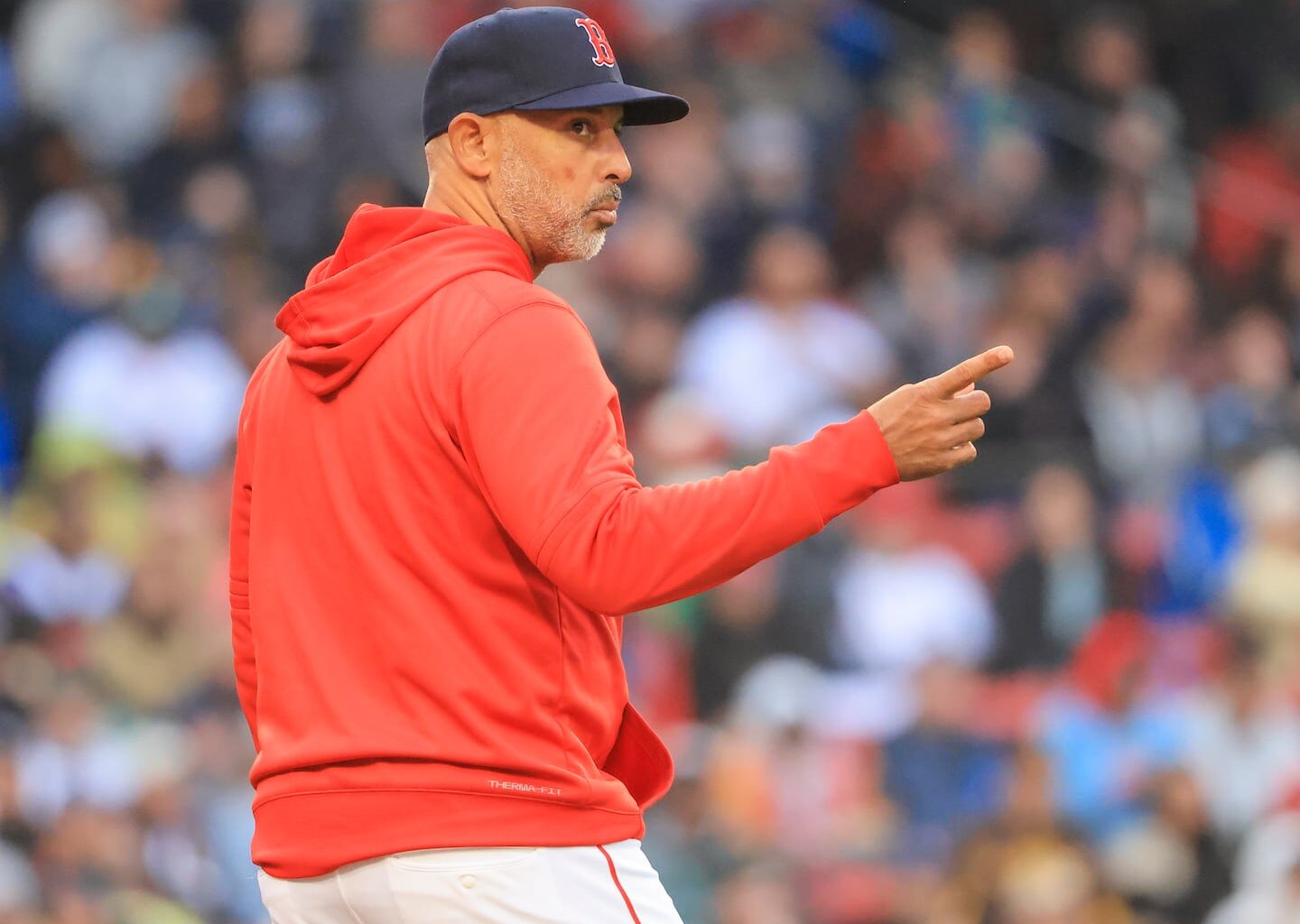 Red Sox manager Alex Cora signals to the bullpen as he comes out to remove Tyler Uberstine, who was making his major league debut, in the eighth inning.