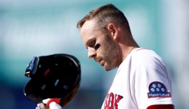 Boston Red Sox shortstop Trevor Story (10) reacts after grounding out resulting in a double play to end the fifth inning during the season home opener against the San Diego Padres at Fenway Park on April 3, 2026 in Boston.