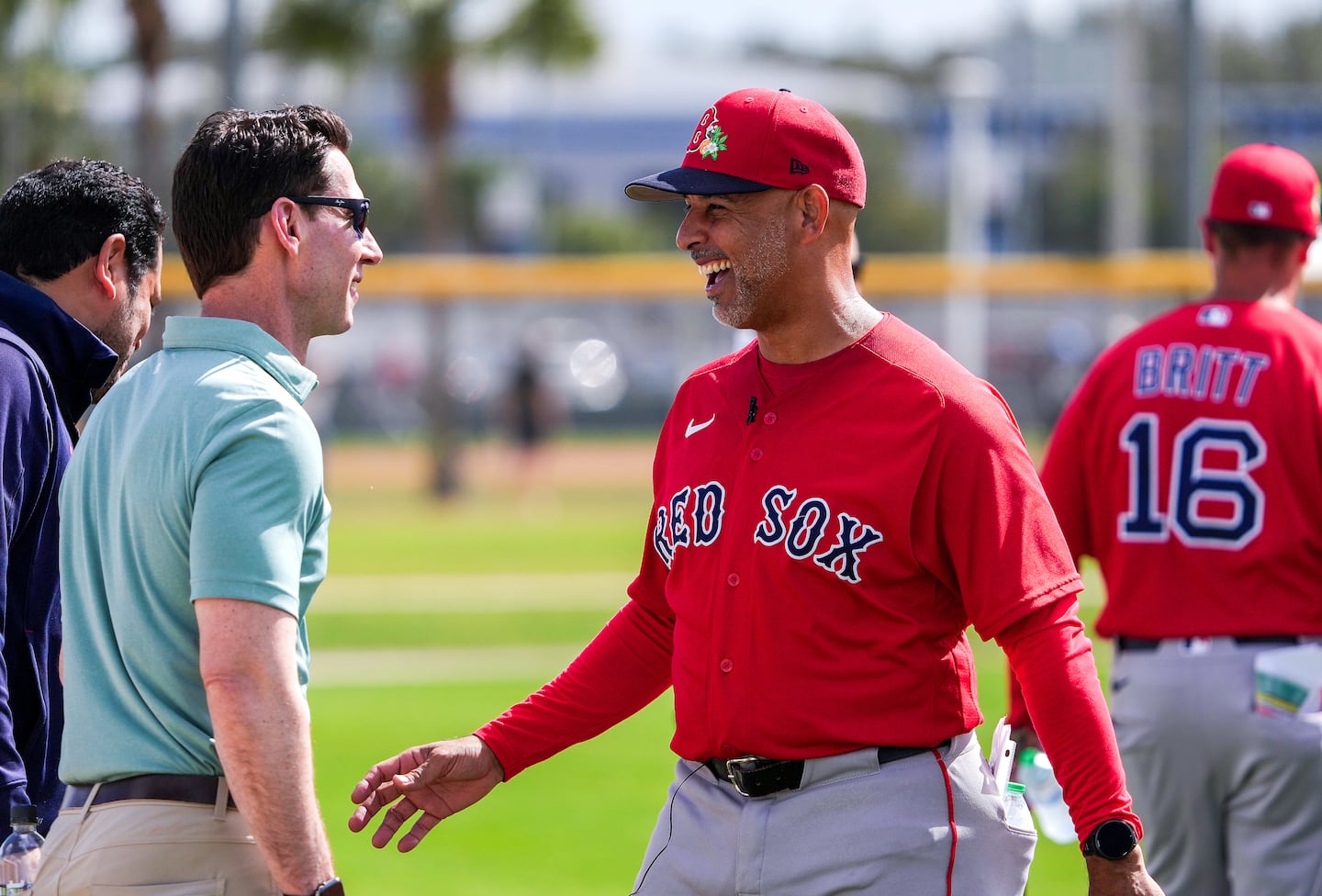 Craig Breslow has full faith in manager Alex Cora (right) and his coaching staff. 
