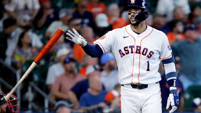 Correa’s 3-run blast powers the Astros past the Red Sox 6-4 for a sweep