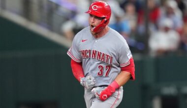 Reds beat Rangers 5-3 in their 1st road game with 3 homers, the last in the 9th