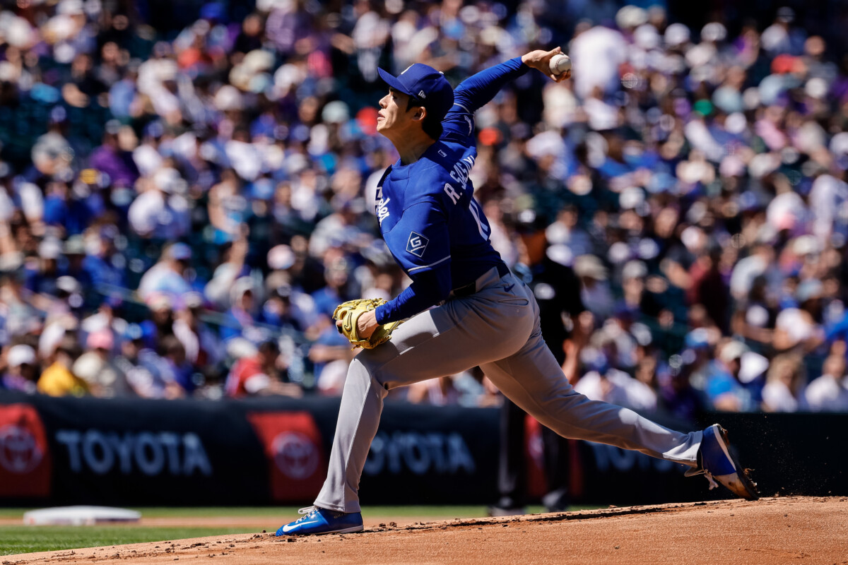 Apr 19, 2026; Denver, Colorado, USA; Los Angeles Dodgers starting pitcher Roki Sasaki (11) pitches in the first inning against the Colorado Rockies at Coors Field. Mandatory Credit: Isaiah J. Downing-Imagn Images