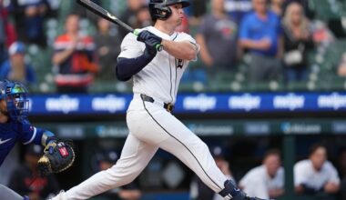 Tigers extend win streak to 6 by rallying in 9th for rain-delayed 10-9 victory over Royals