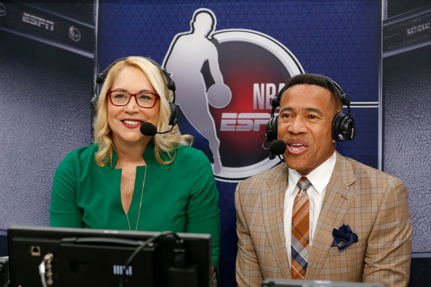 Veteran ESPN announcer Mark Jones (right, with Doris Burke) is signing off from the network after Sunday's Celtics vs. Magic contest.