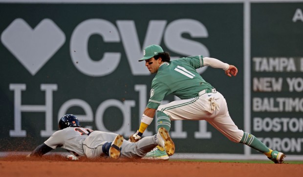 Boston Red Sox third baseman Marcelo Mayer puts the tag on Detroit Tigers right fielder Jahmai Jones at Fenway Park. (Staff photo by Stuart Cahill/Boston Herald)