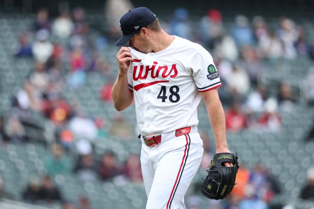 Justin Topa #48 of the Minnesota Twins reacts as he walks off the field during the tenth inning against the Tampa Bay Rays at Target Field on April 5, 2026 in Minneapolis, Minnesota. (Photo by Matt Krohn/Getty Images)