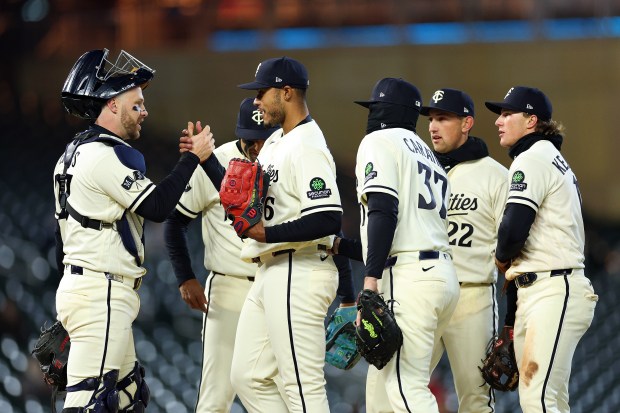 Taj Bradley #26 of the Minnesota Twins (C) celebrates with teammates in the seventh inning at Target Field on April 07, 2026 in Minneapolis, Minnesota. The Twins defeated the Tigers 4-2. (Photo by David Berding/Getty Images)