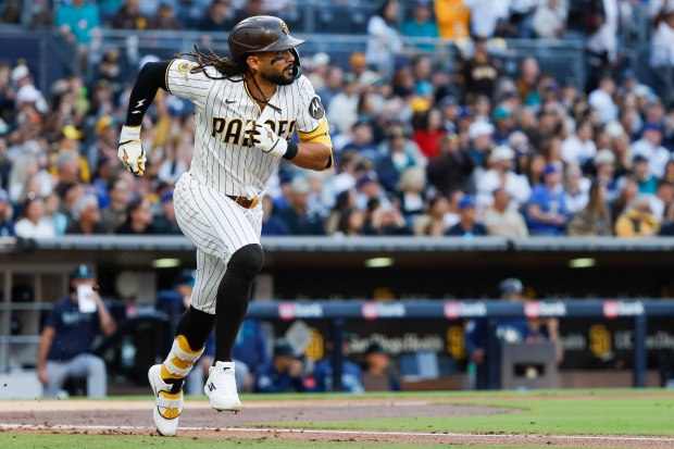 Fernando Tatis Jr. of the San Diego Padres runs after a single against the Seattle Mariners during the second inning at Petco Park on Thursday, April 16, 2026 in San Diego, California. (Meg McLaughlin / The San Diego Union-Tribune)