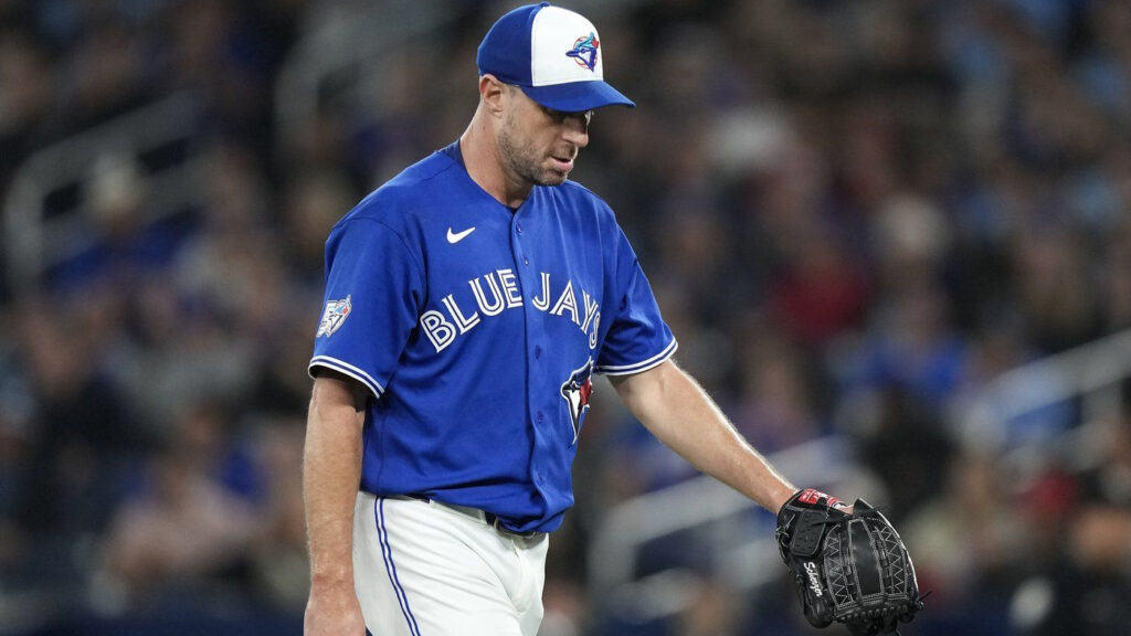 Toronto Blue Jays pitcher Max Scherzer (31) walks back to the dugout after getting pulled against the Minnesota Twins during third inning American League MLB baseball action in Toronto on Sunday, April 12, 2026. THE CANADIAN PRESS/Nathan Denette