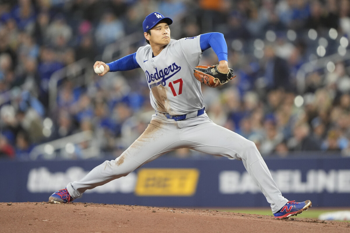 Apr 8, 2026; Toronto, Ontario, CAN; Los Angeles Dodgers starting pitcher Shohei Ohtani (17) pitches to the Toronto Blue Jays during the first inning at Rogers Centre. Mandatory Credit: John E. Sokolowski-Imagn Images