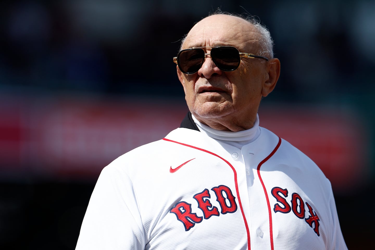 Former Red Sox pitcher Tony Armas walks on the field for the Opening Day ceremony.