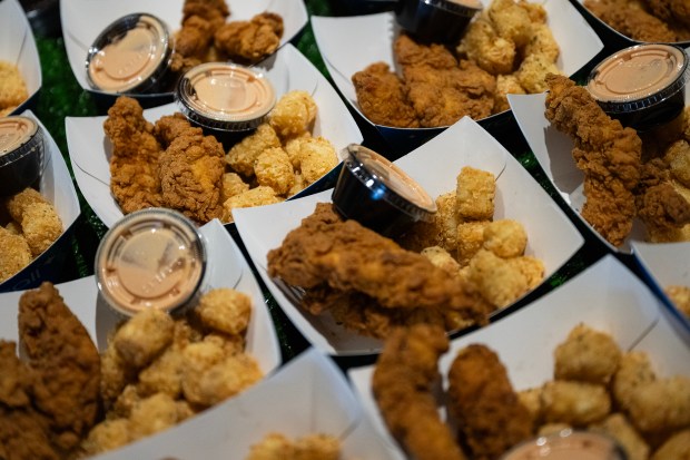 Samples of chicken tenders and tots from Birdcall, as seen on Thursday, April 2, 2026, at Coors Field in Denver. (Photo by Timothy Hurst/The Denver Post)