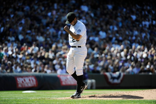 Jorge De La Rosa pumps his fist after striking out Scott Hairston of the San Diego Padres in the 4th inning during the 2010 Colorado Rockies home opener April 9, 2010 at Coors Field in Denver. (Photo by Andy Cross/The Denver Post)