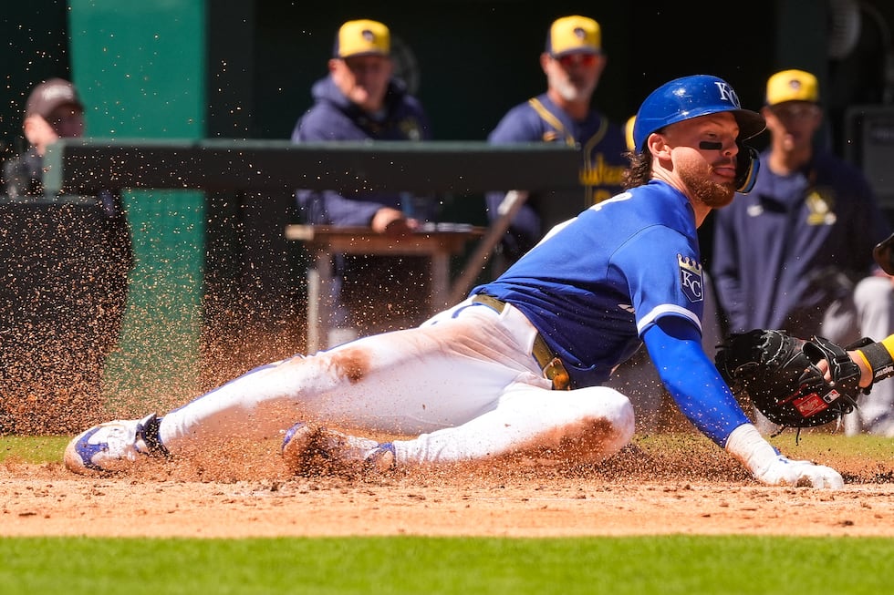 Kansas City Royals' Bobby Witt Jr. is tagged out by Milwaukee Brewers catcher William...