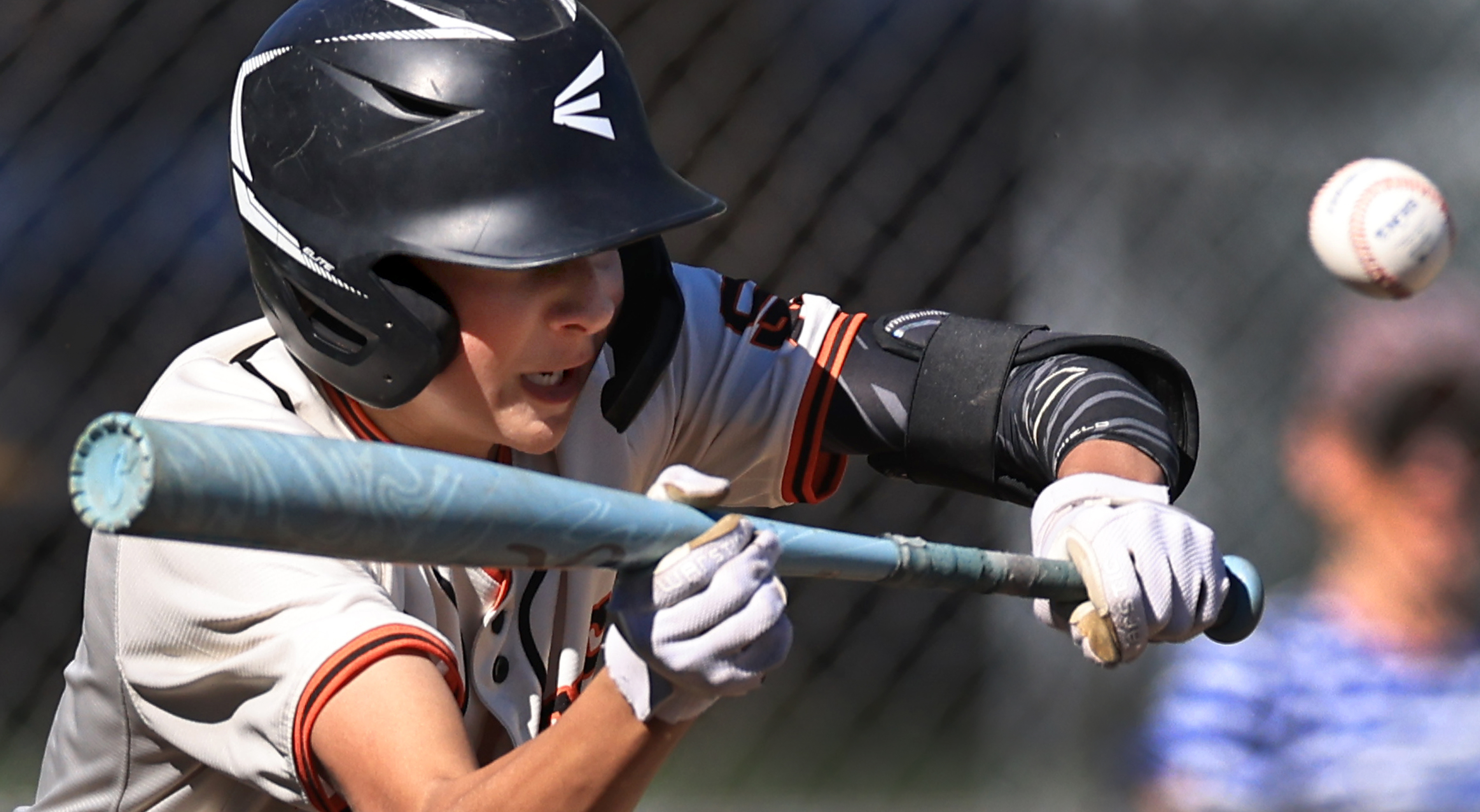 Micah Stiles of Santa Rosa lays down a bunt against...