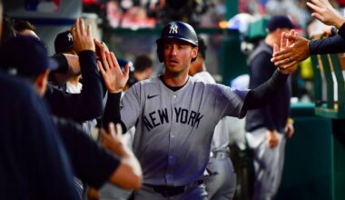 May 27, 2025; Anaheim, California, USA; New York Yankees left fielder Cody Bellinger (35) is greeted after scoring a run against the Los Angeles Angels during the sixth inning at Angel Stadium. Mandatory Credit: Gary A. Vasquez-Imagn Images