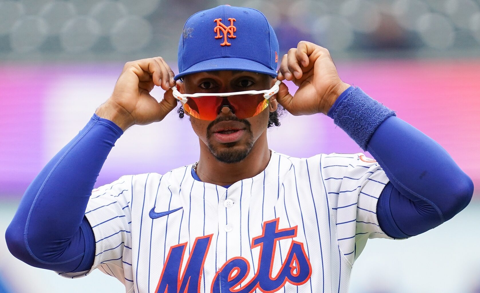 May 28, 2025; New York, New York, USA; New York Mets shortstop Francisco Lindor (12) warms up before the game against the Chicago White Sox at Citi Field. Mandatory Credit: Lucas Boland-Imagn Images