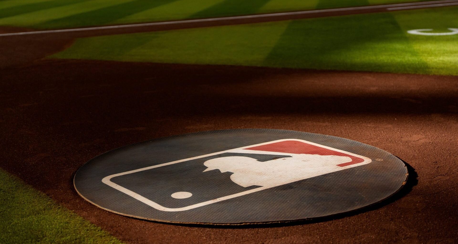 Aug 23, 2025; Phoenix, Arizona, USA; A general view of the MLB logo before the start of a game between the Cincinnati Reds and Arizona Diamondbacks at Chase Field.