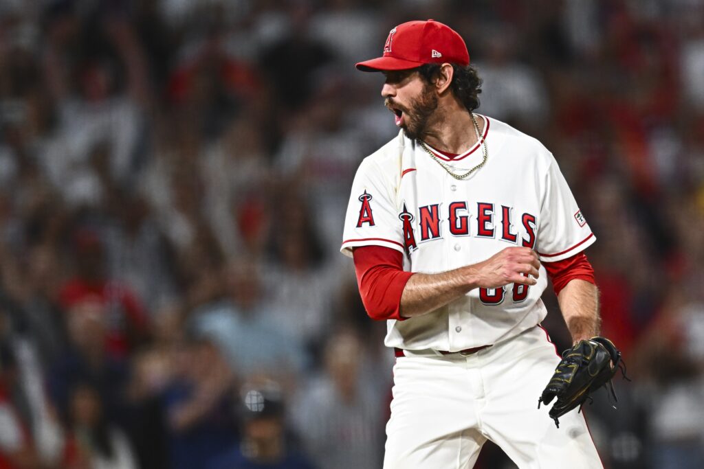 Apr 4, 2026; Anaheim, California, USA; Los Angeles Angels pitcher Jordan Romano (68) reacts after throwing final striking out to end the game against the Seattle Mariners during the ninth inning at Angel Stadium.