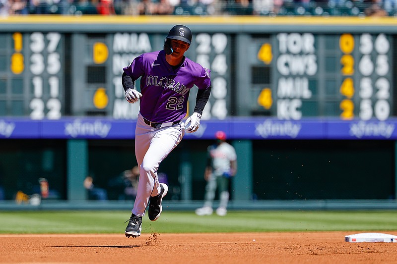 Apr 5, 2026; Denver, Colorado, USA; Colorado Rockies right fielder Mickey Moniak (22) rounds the bases on a solo home run in the first inning against the Philadelphia Phillies at Coors Field. Mandatory Credit: Isaiah J. Downing-Imagn Images