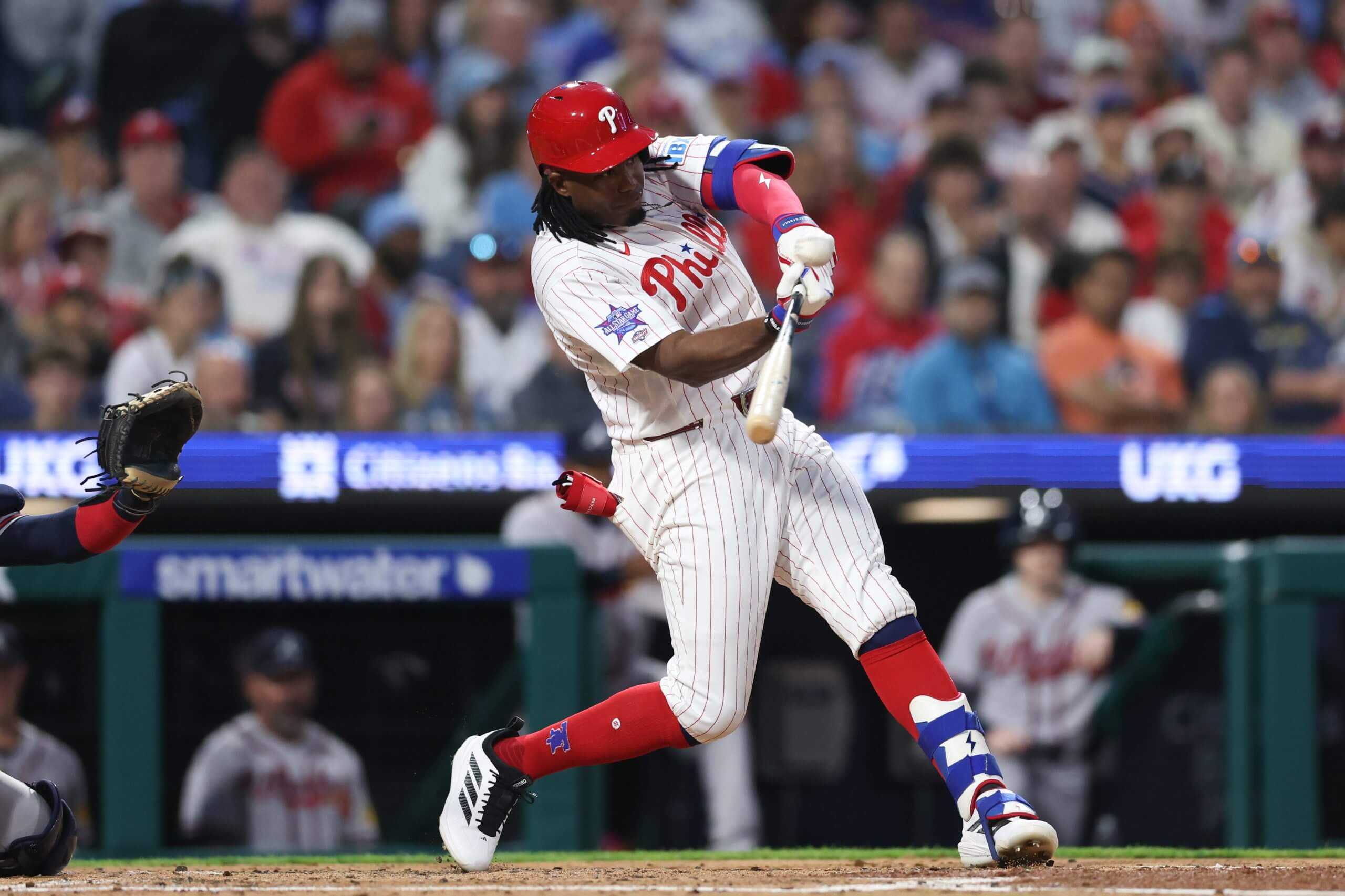 Philadelphia Phillies outfielder Felix Reyes hits a home run in his first major-league at-bat.