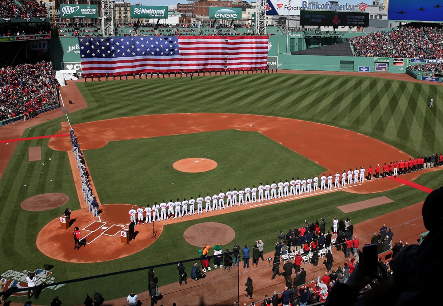 Boston, MA- April 05, 2018: Opening ceremony included a flyover during the Boston Red Sox home opener against the Tampa Bay Rays at Fenway Park in Boston, MA on  April 05, 2018.