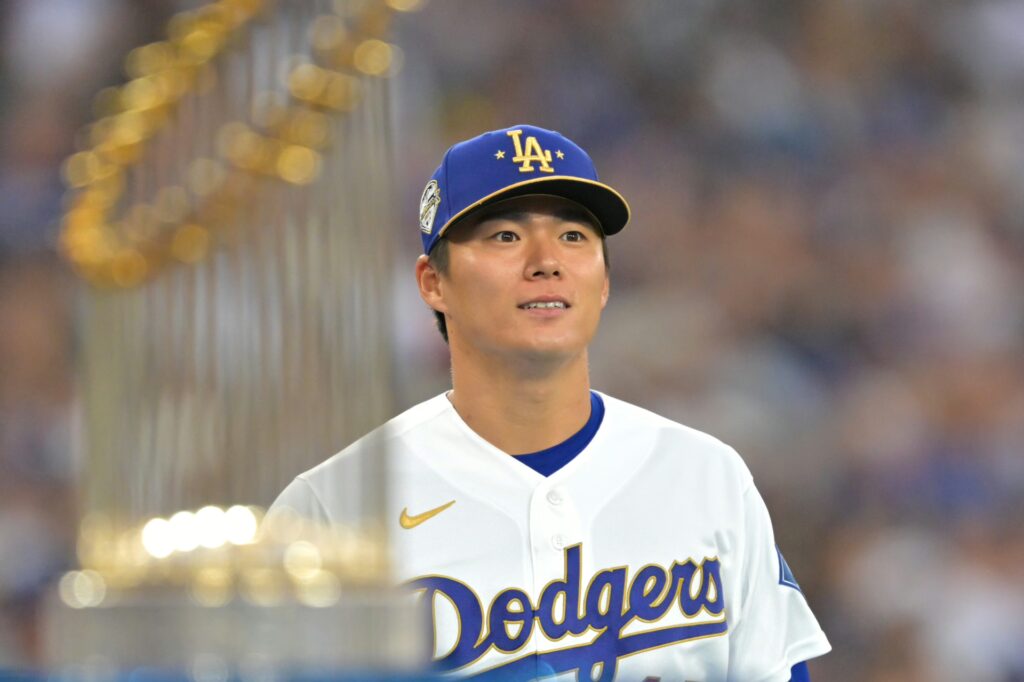 Mar 27, 2026; Los Angeles, California, USA; Los Angeles Dodgers pitcher Yoshinobu Yamamoto (18) is introduced to receive his World Series ring during a ceremony prior to the game against the Arizona Diamondbacks at Dodger Stadium. Mandatory Credit: Jayne Kamin-Oncea-Imagn Images
