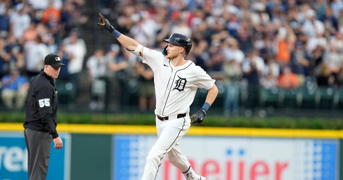 Detroit Tigers' Parker Meadows leaves game on a cart after a head-to-head collision with teammate Riley Greene