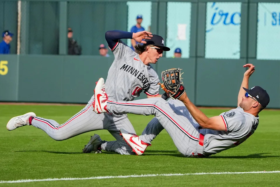 Minnesota Twins second baseman Luke Keaschall (15) and right fielder Matt Wallner (38). © Denny Medley-Imagn Images
