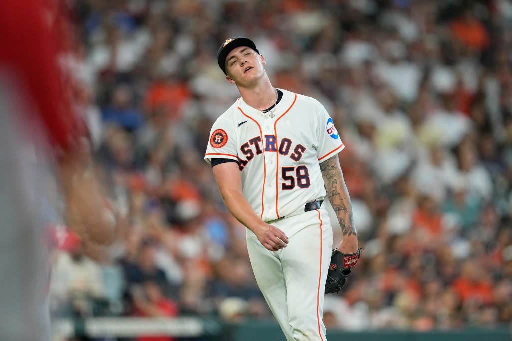 Houston Astros starting pitcher Hunter Brown reacts after giving up a single to Los Angeles Angels’ Jorge Soler during the fifth inning of an opening-day baseball game Thursday, March 26, 2026, in Houston. AP