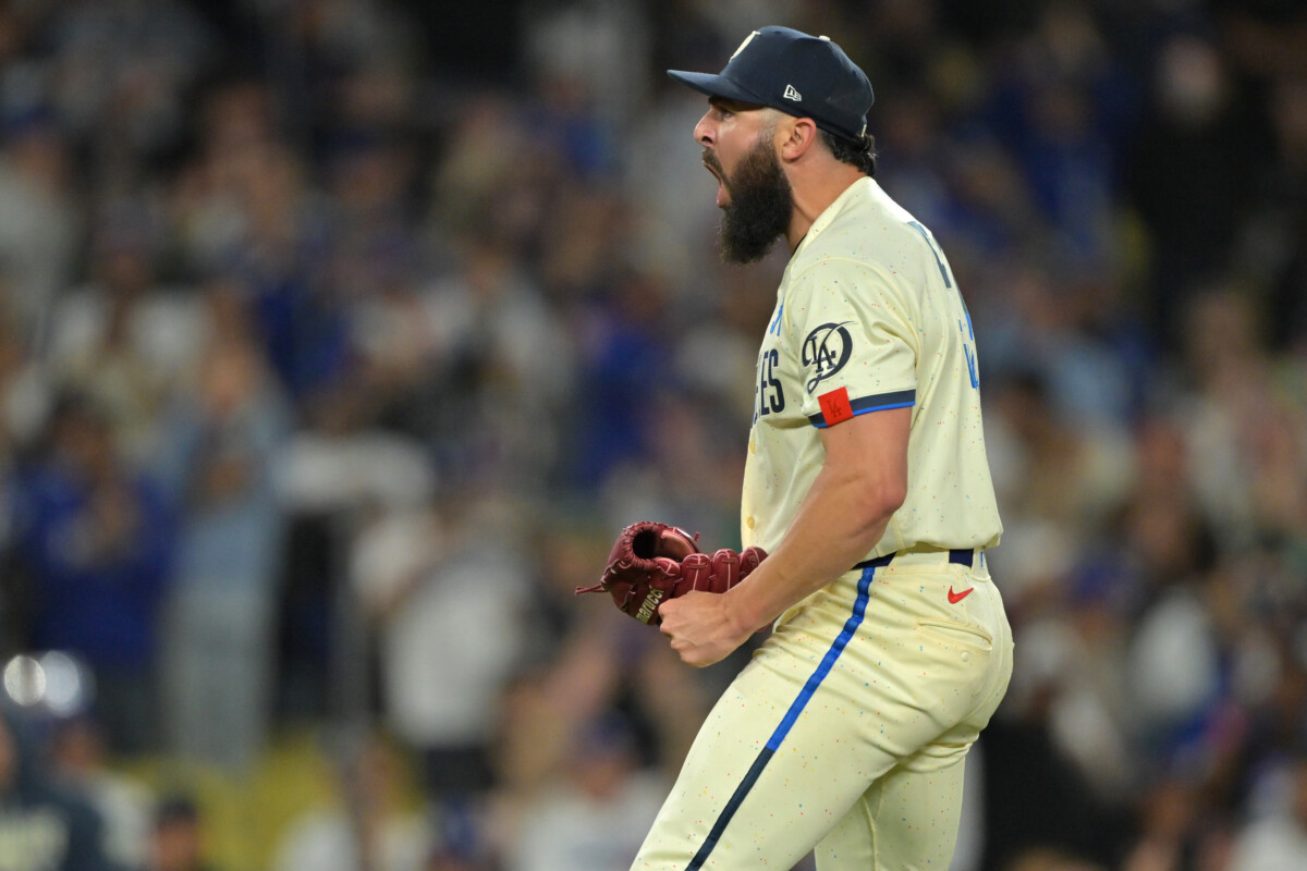 Apr 11, 2026; Los Angeles, California, USA; Los Angeles Dodgers pitcher Alex Vesia (51) reacts after striking out Texas Rangers catcher Danny Jansen (9) for the final out of the ninth inning at Dodger Stadium. Mandatory Credit: Jayne Kamin-Oncea-Imagn Images