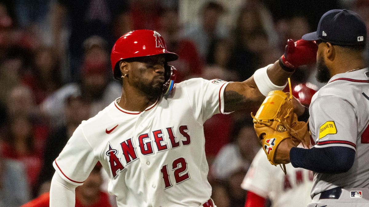 Los Angeles Angels' Jorge Soler and Atlanta Braves' Reynaldo López fighting during a baseball game