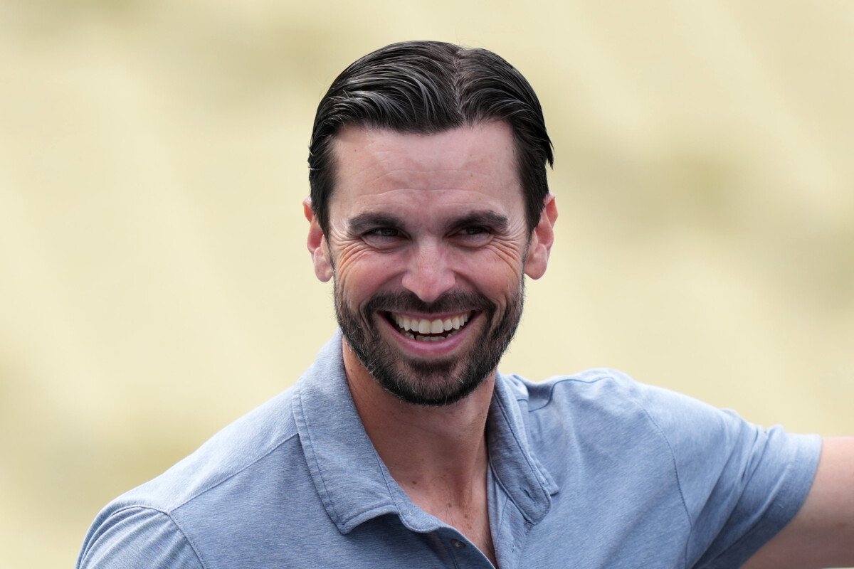 Mar 30, 2026; Los Angeles, California, USA; Los Angeles Dodgers general manager and executive vice president Brandon Gomes watches batting practice before the game against the Cleveland Guardians at Dodger Stadium. Mandatory Credit: Kirby Lee-Imagn Images
